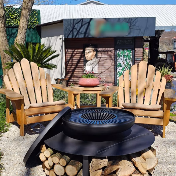 Fumolio Fuji fire pit with grill in a modern outdoor patio setting