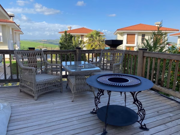 Fumolio Mayon fire pit in natural setting – premium outdoor fireplace for BBQ and garden ambiance