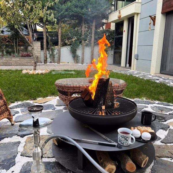 Fumolio Fuji fire pit – outdoor BBQ and fireplace in boutique patio setting