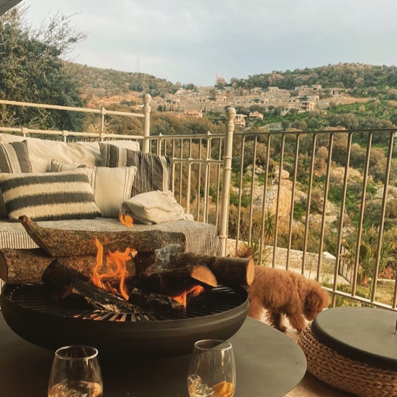 Close-up of Fumolio Fuji fire pit showcasing grill feature