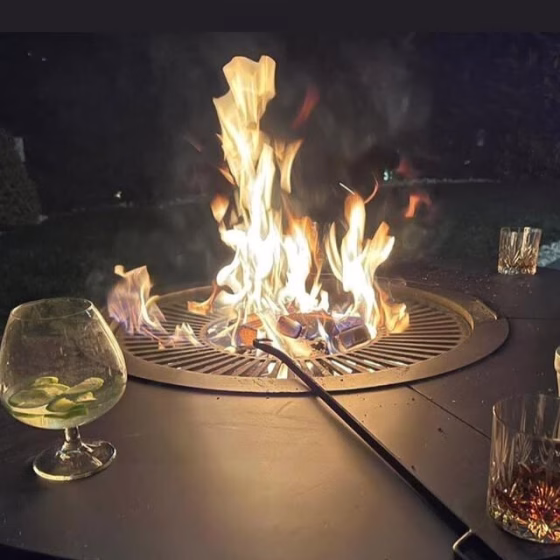 Fumolio Maria handmade steel fire pit in luxury patio setting