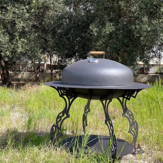 Handmade steel fire pit Mauna by Fumolio used in a boutique hotel patio